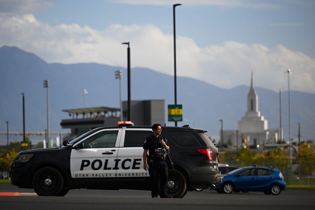 FILE - A law enforcement officer stands outside Utah Valley University on Sept. 10, 2025, in Orem, Utah. (AP Photo/Alex Goodlett, File)