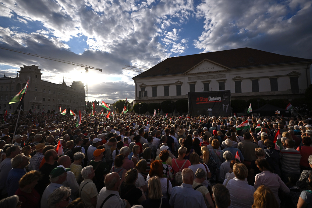 Former Hungarian President Janos Ader, center, speaks during the protest held by Fidesz and KDNP against the amendment of the Basic Law in front of the presidential Alexander Palace in Budapest, Hungary, Thursday, July 9, 2026. (Tibor Illyes/MTI via AP)