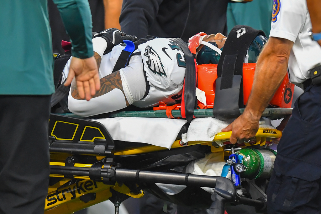 Philadelphia Eagles' Ja'Quinden Jackson is taken off the field on a stretcher after an injury against the New England Patriots during the first half of an NFL preseason football game, Saturday, Aug. 22, 2026, in Foxborough, Mass. (AP Photo/Steven Senne)