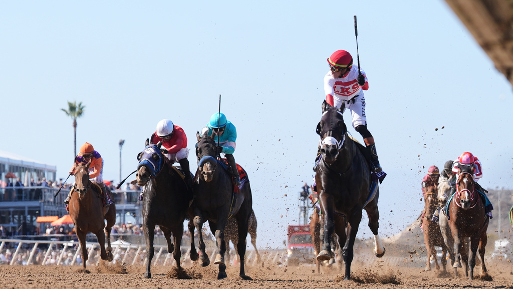 Irad Ortiz Jr. rides Bentornato to victory in the Breeders' Cup Sprint horse race on Saturday, Nov. 1, 2025, in Del Mar, Calif. (AP Photo/Gregory Bull)