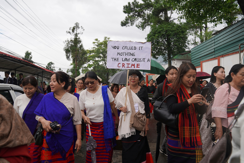 Indigenous Nagas participate in a protest against rising cases of sexual violence against women and demanding justice for victims, in Kohima, capital of the northeastern Indian state of Nagaland, Friday, June 19, 2026. (AP Photo/Yirmiyan Arthur)