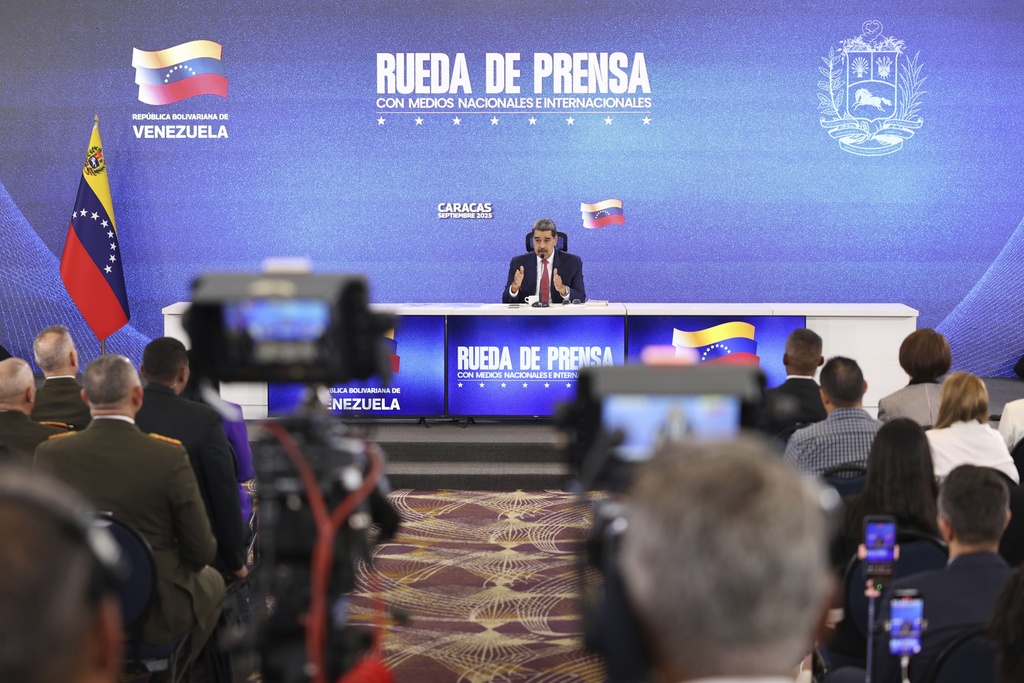 Venezuelan President Nicolas Maduro gives a press conference in Caracas, Venezuela, Monday, Sept 15, 2025. (AP Photo/Jesus Vargas)