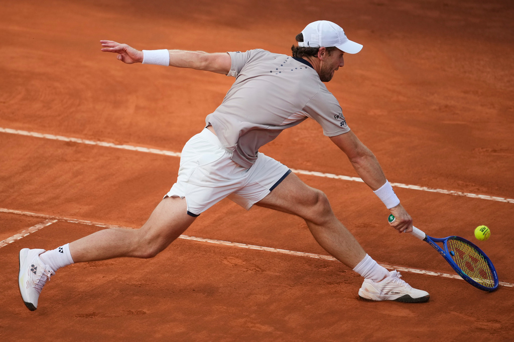 Casper Ruud of Norway returns a ball to Luciano Darderi of Italy during their semifinal match at the Italian Open tennis tournament in Rome, Friday, May 15, 2026. (AP Photo/Andrew Medichini)