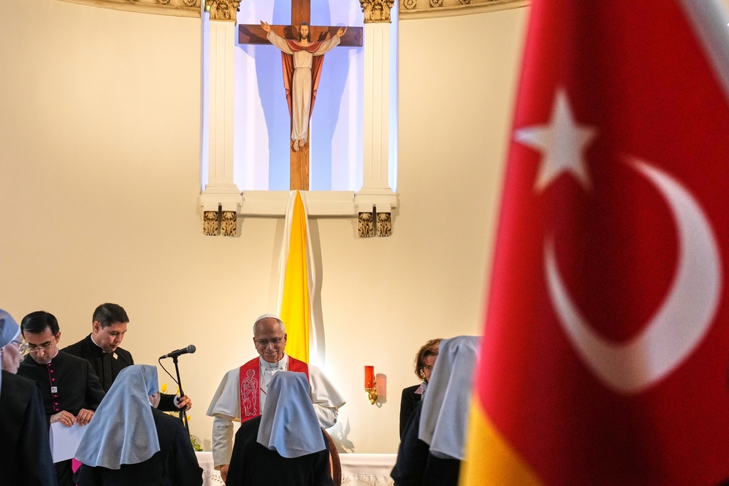 Pope Leo XIV visits the nursing home of the Little Sisters of the Poor, in Istanbul, Turkey, Friday, Nov. 28, 2025. (AP Photo/Domenico Stinellis)