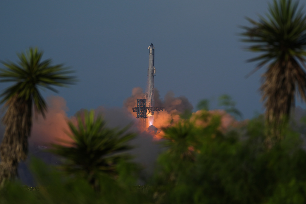 SpaceX's mega rocket Starship makes a test flight from Starbase, Texas, Tuesday, Aug. 26, 2025. (AP Photo/Eric Gay)