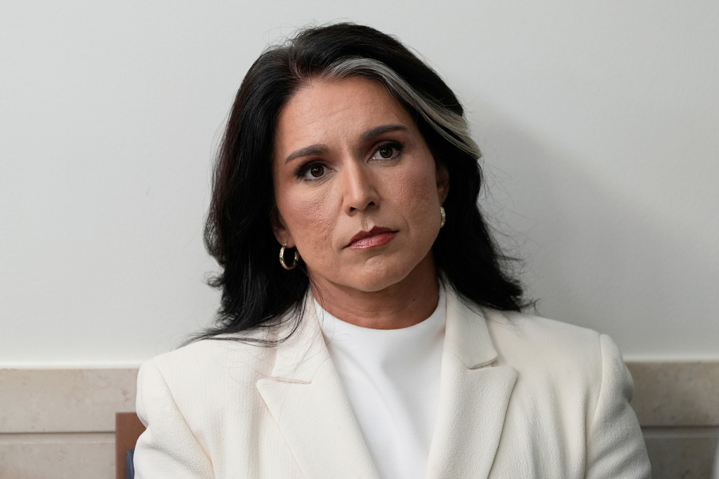 FILE - Director of National Intelligence Tulsi Gabbard sits in the James Brady Press Briefing Room at the White House, July 23, 2025, in Washington. (AP Photo/Alex Brandon, File)