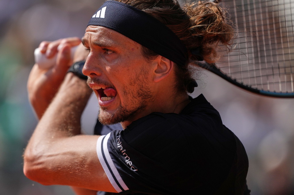 Germany's Alexander Zverev returns during the final tennis match against Italy's Flavio Cobolli at the French Open in Paris, Sunday, June 7, 2026. (AP Photo/Thibault Camus)