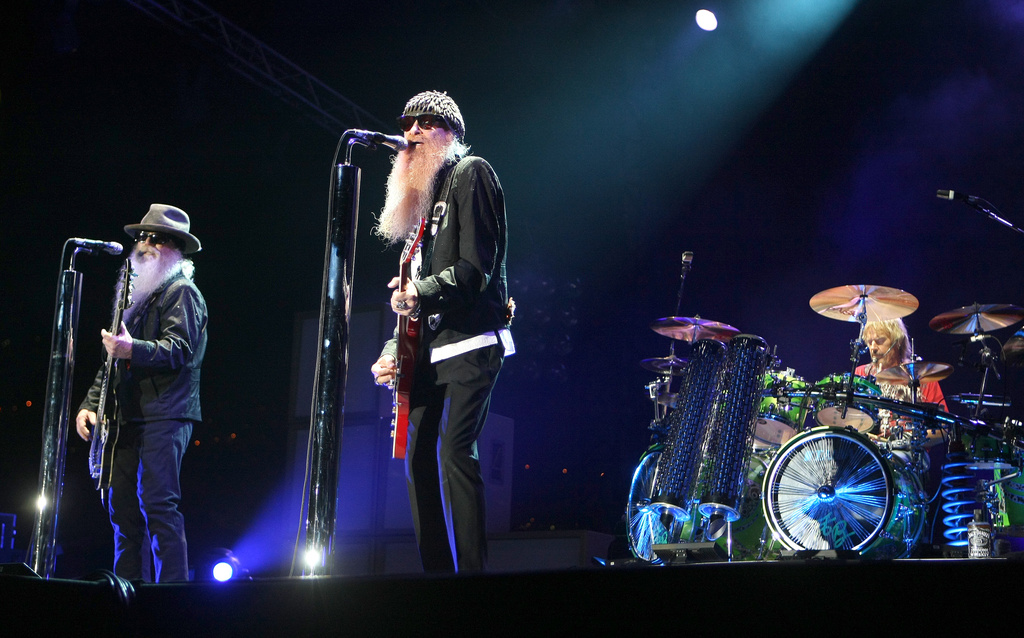 FILE - Dusty Hill, from left, Billy Gibbons and Frank Beard of ZZ Top, perform in Monaco on July 5, 2010. (AP Photo/Lionel Cironneau, File) CORRECTION: Corrects position of Billy Gibbons and Dusty Hill.