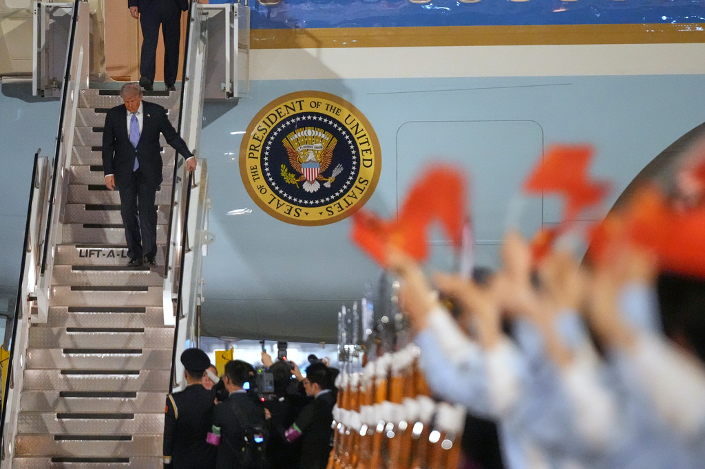 President Donald Trump arrives on Air Force One, Wednesday, May 13, 2026, at Beijing Capital International Airport in Beijing. (AP Photo/Mark Schiefelbein)