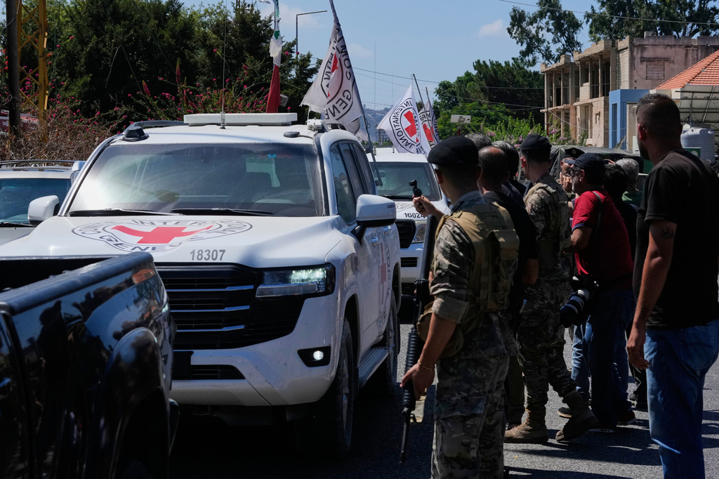 A Red Cross convoy escorts four released prisoners who were held in Israeli prisons as they arrive in the southern village of Mansouri, Lebanon, Friday, Sept. 4, 2026. (AP Photo/Mohammed Zaatari)