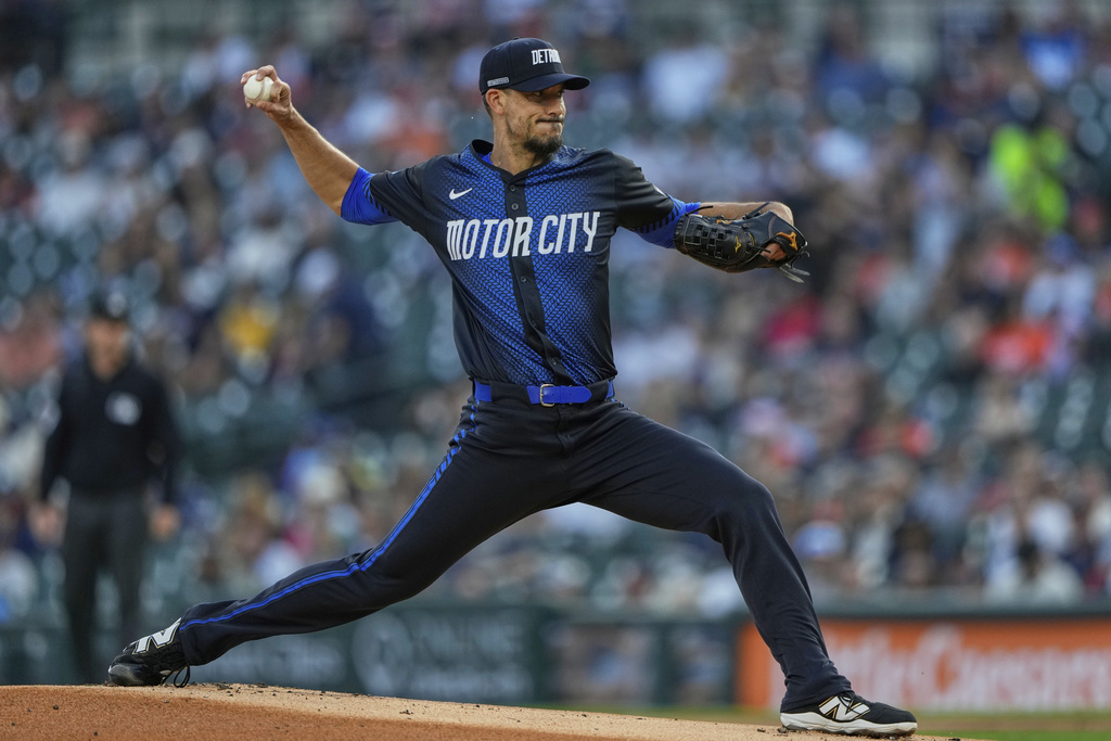 Detroit Tigers starting pitcher Charlie Morton throws during the first inning of a baseball game against the Atlanta Braves, Friday, Sept. 19, 2025, in Detroit. (AP Photo/Ryan Sun)
