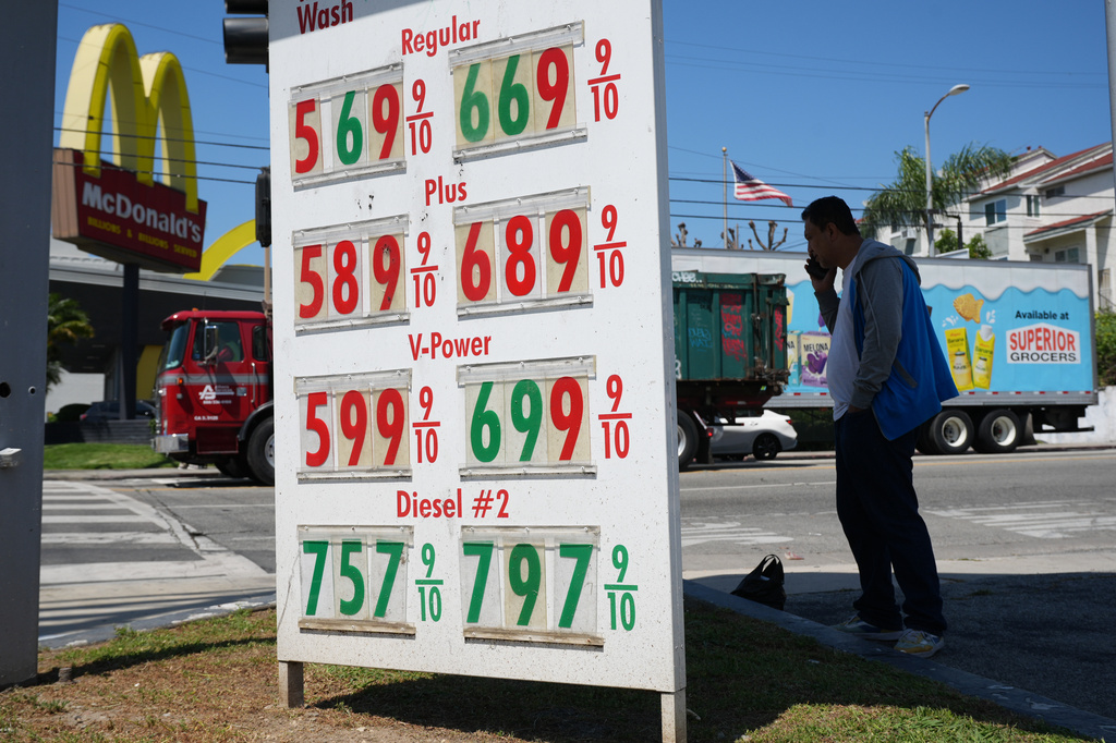 FILE - Gas prices are displayed at a gasoline station, Tuesday, April 7, 2026, in Los Angeles. (AP Photo/Damian Dovarganes, File)