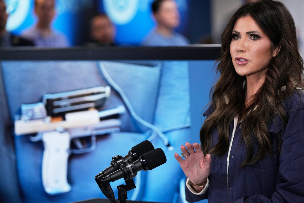 Homeland Security Secretary Kristi Noem speaks during a news conference at Federal Emergency Management Agency headquarters, Saturday, Jan. 24, 2026, in Washington. (AP Photo/Julia Demaree Nikhinson)