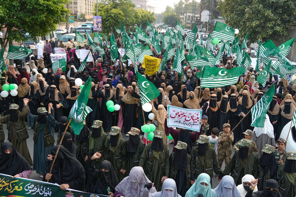 Supporters of ' Muslim women league Pakistan, hold a rally to mark the anniversary of last year's four-day conflict with neighboring India, Thursday, May 7, 2026, in Lahore, Pakistan. (AP Photo/K.M. Chaudary)