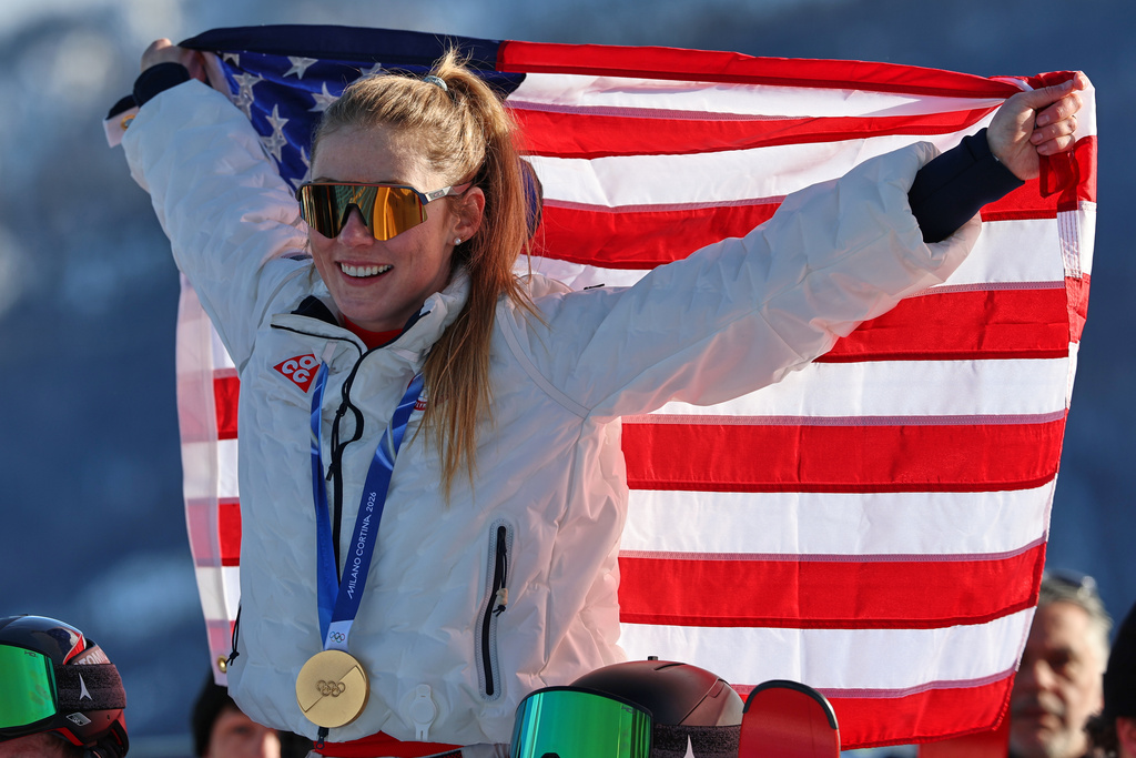 United States' Mikaela Shiffrin celebrates winning the gold medal of the alpine ski, women's slalom race, at the 2026 Winter Olympics, in Cortina d'Ampezzo, Italy, Wednesday, Feb. 18, 2026. (AP Photo/Marco Trovati)
