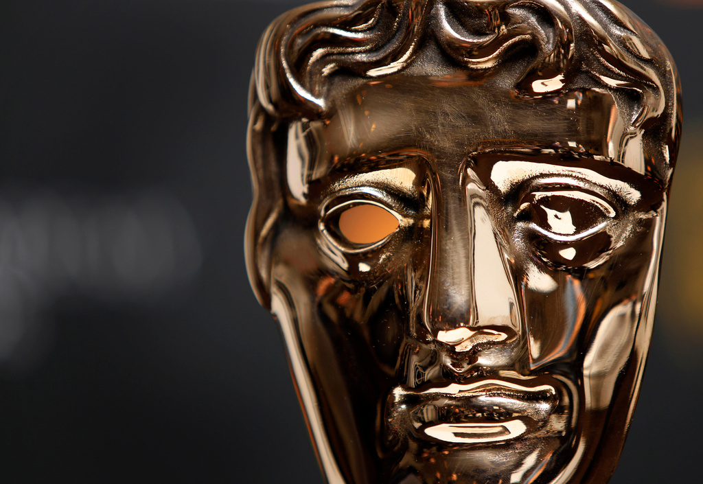 FILE - A BAFTA mask after the nominations for the Orange British Academy Film Awards 2011 were announced, Tuesday, Jan. 18, 2011, in Piccadilly, London. (AP Photo/Joel Ryan, File)