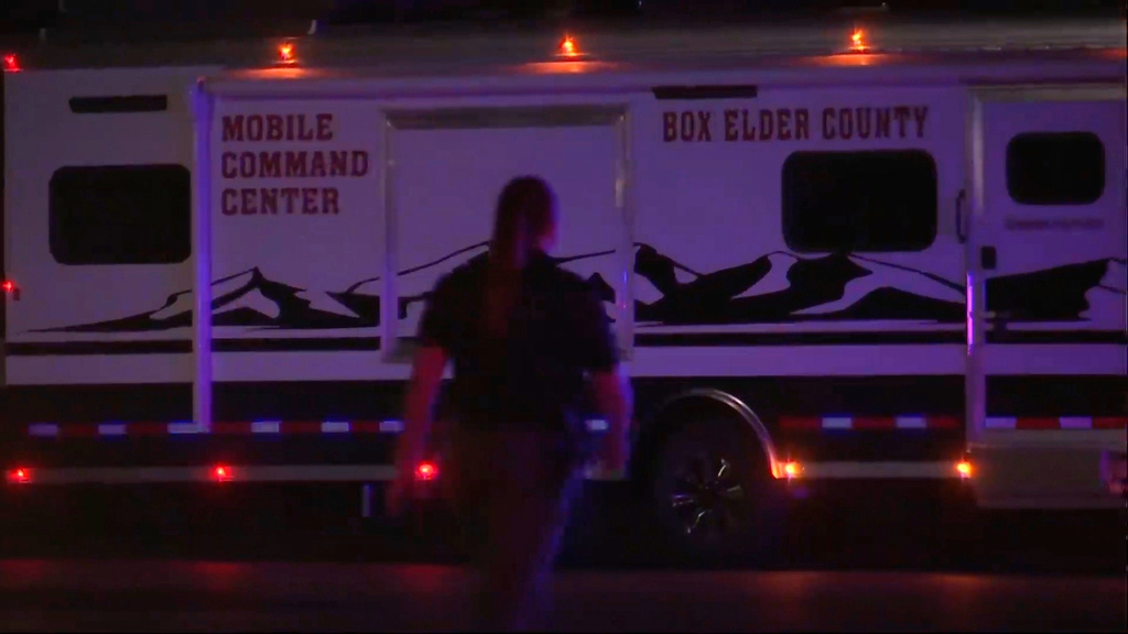 In this image made from video provided by KTVX, police at the scene of a shooting in Tremonton, Ut., Sunday, Aug. 17, 2025. (KTVX via AP)