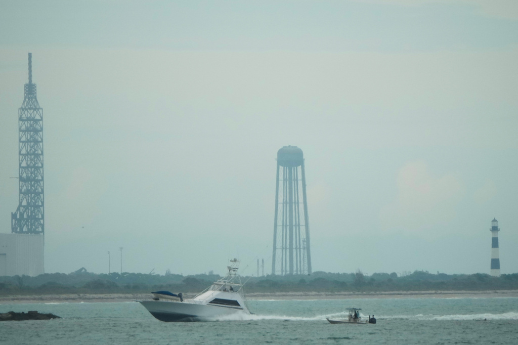 A lightning arrester and a charred water tower are seen at pad 36 in the aftermath of the Blue Origin New Glenn rocket explosion at the Cape Canaveral Space Force Station, Friday, May 29, 2026, in Cape Canaveral, Fla. (AP Photo/John Raoux)