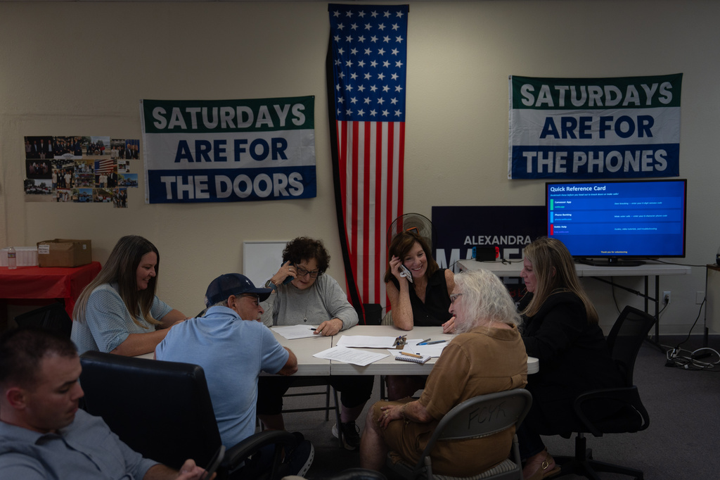 Volunteers take part in phone bank training at a National Republican Congressional Committee office in Hanford, Calif., Friday, Aug. 21, 2026. (AP Photo/Jae C. Hong)
