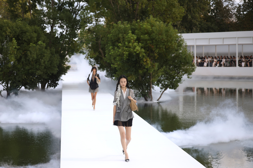 A model wears a creation as part of the Christian Dior Womenswear Spring Summer 2027 collection presented in Paris, France, Tuesday, Sept. 29, 2026. (AP Photo/Thomas Padilla)