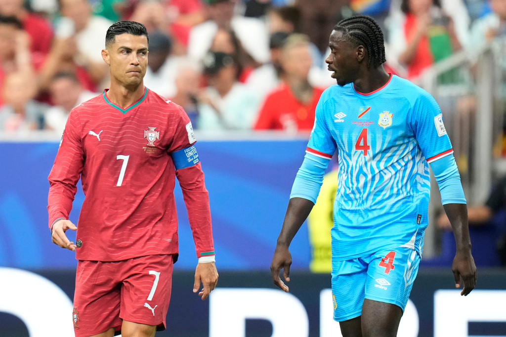 Portugal's Cristiano Ronaldo, left, and Congo's Axel Tuanzebe react during the World Cup Group K soccer match between Portugal and Congo in Houston, Wednesday, June 17, 2026. (AP Photo/Karen Warren)