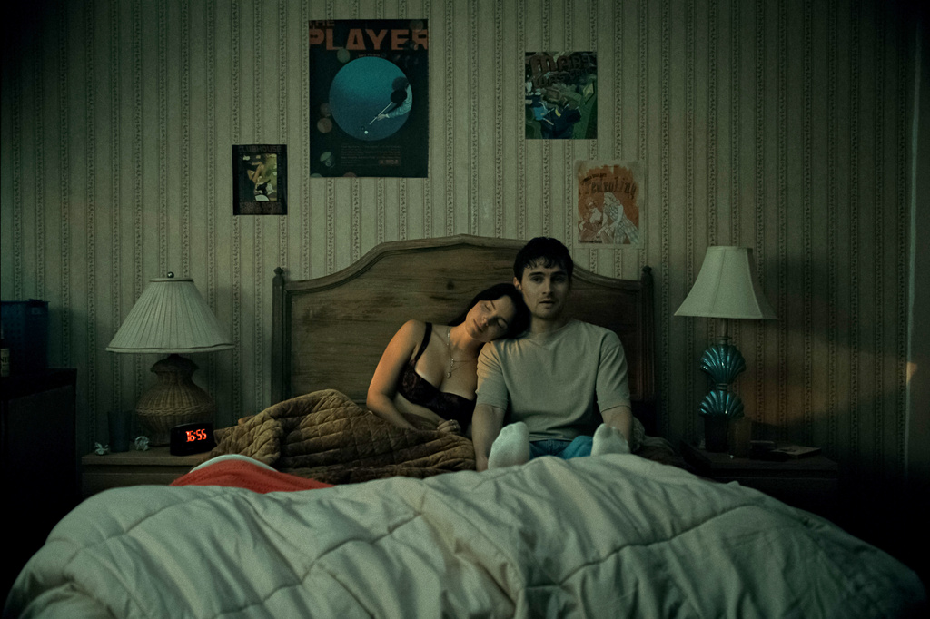 This image released by Focus Features shows Inde Navarrette and Michael Johnston in a scene from "Obsession." (Focus Features via AP)