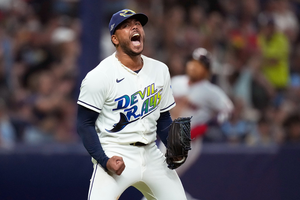 Tampa Bay Rays pitcher Freddy Peralta celebrates the last out in the top of the fifth inning in Game 2 of an American League Championship Series baseball game against the Cleveland Guardians in St. Petersburg, Fla. Tuesday, Oct. 13, 2026. (AP Photo/David J. Phillip)