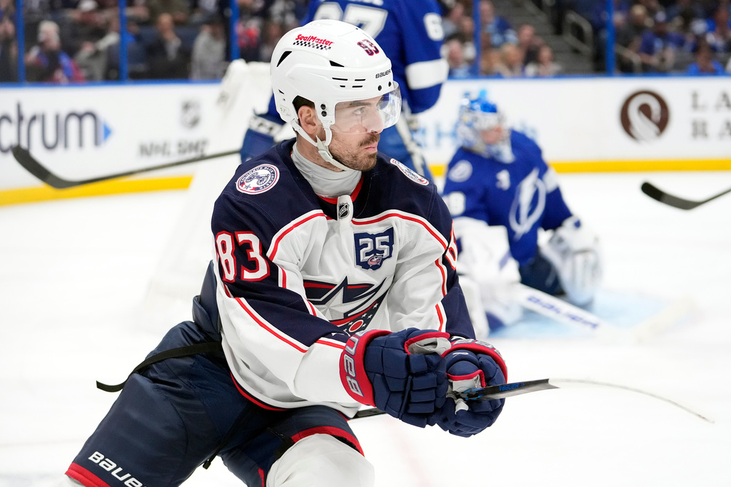 Columbus Blue Jackets right wing Conor Garland (83) celebrates after scoring against the Tampa Bay Lightning during the third period of an NHL hockey game Tuesday, March 10, 2026, in Tampa, Fla. (AP Photo/Chris O'Meara)