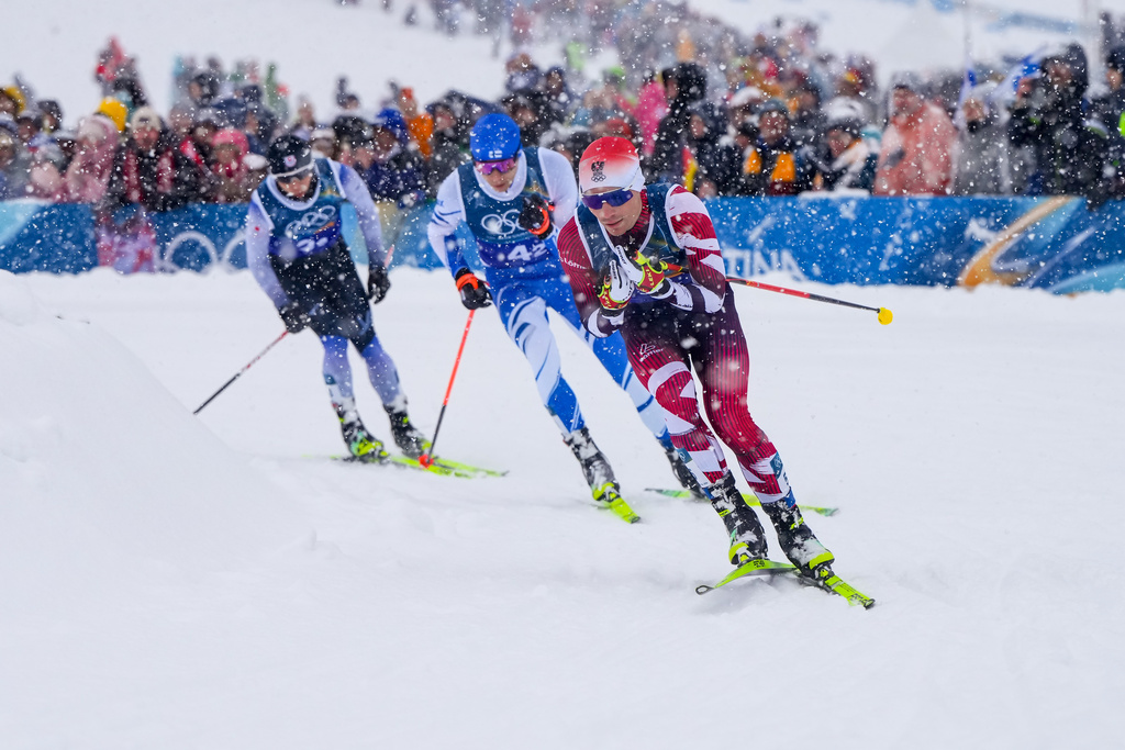 Johannes Lamparter, of Austria, from right, Eero Hirvonen, of Finland, and Ryota Yamamoto, of Japan, compete in the nordic combined team sprint at the 2026 Winter Olympics, in Tesero, Italy, Thursday, Feb. 19, 2026. (AP Photo/Kirsty Wigglesworth)