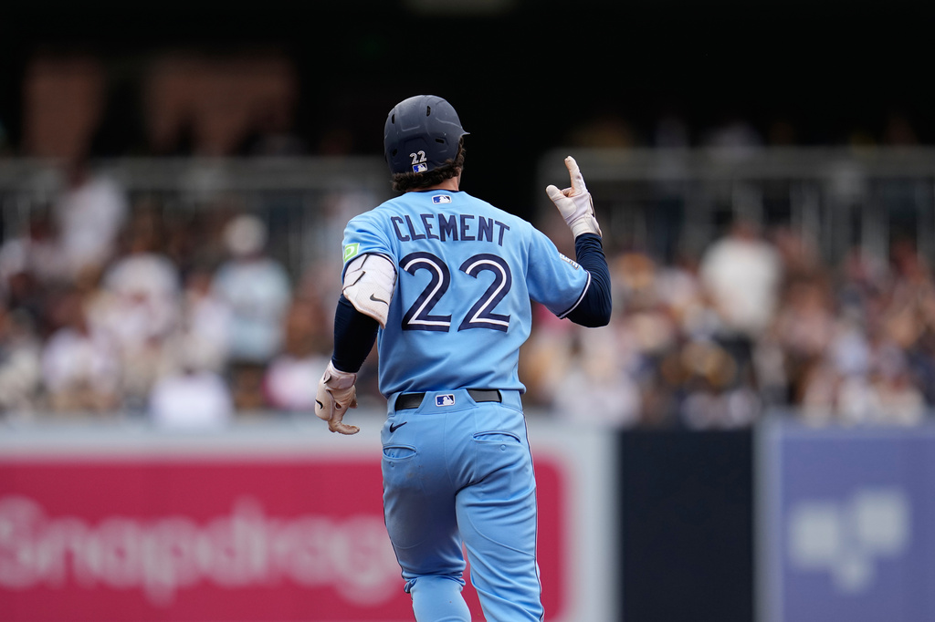 Toronto Blue Jays' Ernie Clement celebrates after hitting a two-run home run during the fourth inning of a baseball game against the San Diego Padres Sunday, July 12, 2026, in San Diego. (AP Photo/Gregory Bull)