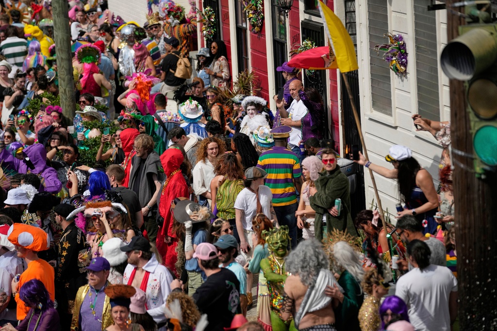 FILE - The streets are filled during the Society of Saint Anne's parade on Mardi Gras Day, March 4, 2025 in New Orleans. (AP Photo/Gerald Herbert, File)