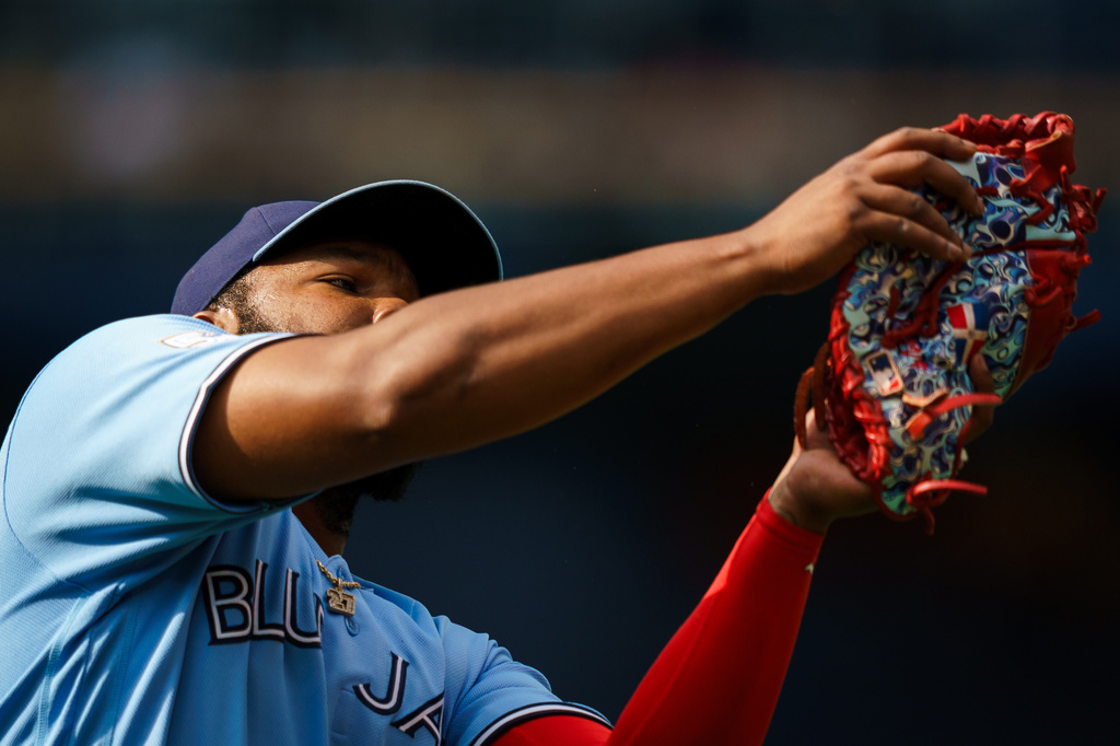 Toronto Blue Jays' Vladimir Guerrero Jr. (27) catches a pop fly from Detroit Tigers' Dillon Dingler (13) during the fourth inning of a baseball game in Toronto, Wednesday, Sept. 16, 2026. (Nathan Denette/The Canadian Press via AP)
