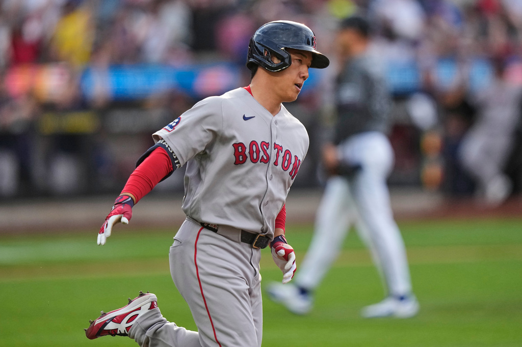 Boston Red Sox's Masataka Yoshida, of Japan, runs the bases after hitting a two-run home run during the eighth inning of a baseball game against the New York Mets Saturday, July 11, 2026, in New York. (AP Photo/Frank Franklin II)