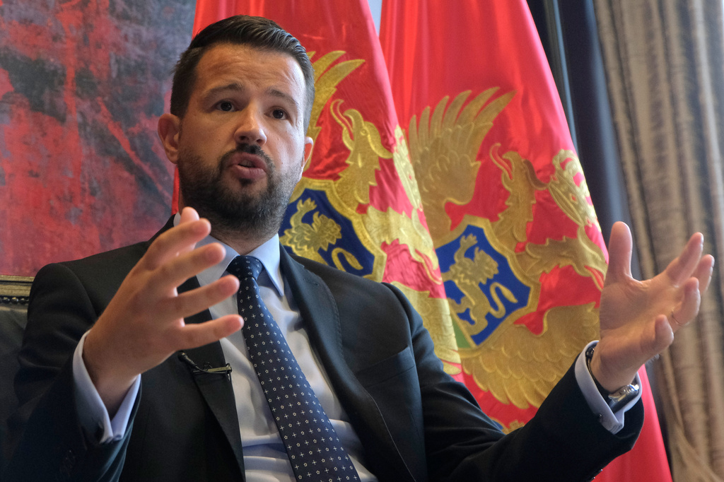 Montenegro's President Jakov Milatovic gestures during an interview with The Associated Press in Montenegro's capital Podgorica, Tuesday, May 19, 2026. (AP Photo/Risto Bozovic)