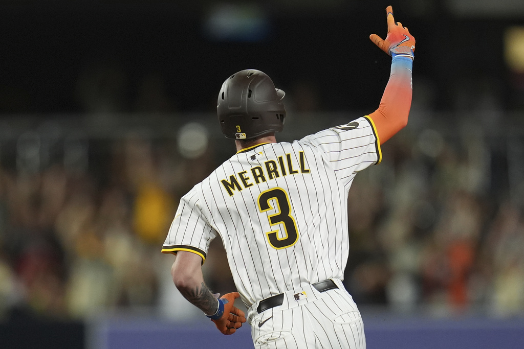 San Diego Padres' Jackson Merrill celebrates after hitting a home run during the fourth inning of a baseball game against the Colorado Rockies Thursday, Sept. 11, 2025, in San Diego. (AP Photo/Gregory Bull)