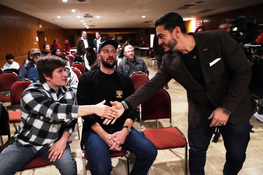 U.S. Senate candidate for Michigan Abdul El-Sayed greets visitors during a town hall, Tuesday, Nov. 11, 2025, in Lincoln Park, Mich. (AP Photo/Ryan Sun)
