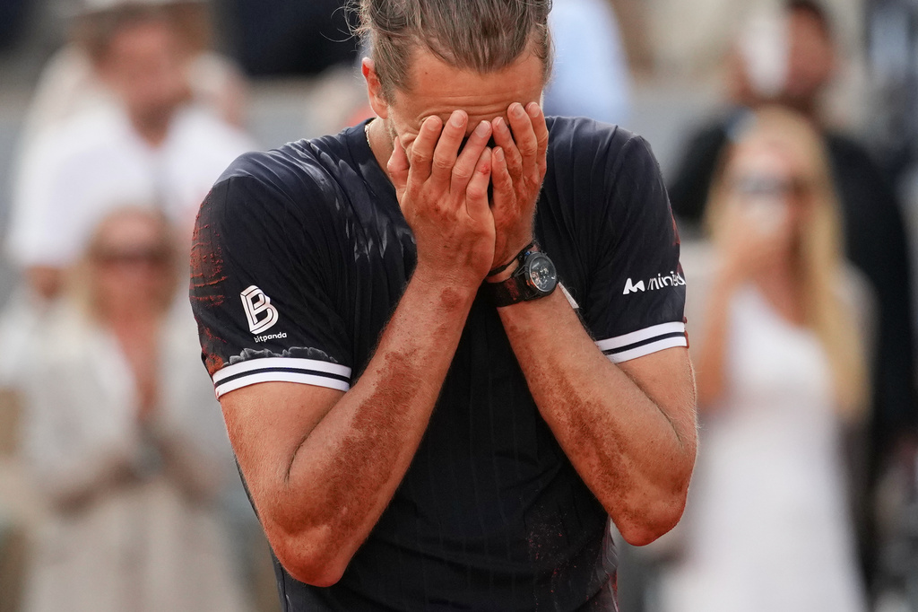 Alexander Zverev of Germany celebrates after winning the men's final match against Flavio Cobolli of Italy at the French Open tennis tournament in Paris, Sunday, June 7, 2026. (AP Photo/Christophe Ena)