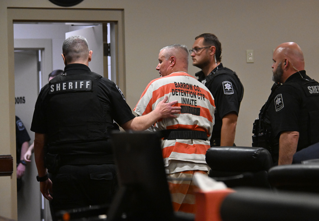 Colin Gray, father of the Apalachee High School shooter Colt Gray, is handcuffed following his sentencing during his sentencing hearing at Barrow County Superior Court on Thursday, July 30, 2026, in Winder, Ga. (Hyosub Shin/Atlanta Journal-Constitution via AP, Pool)