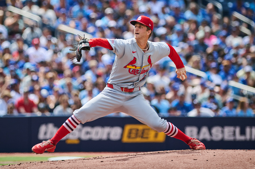 St. Louis Cardinals' Quinn Mathews (60) works against the Toronto Blue Jays during the first inning of a baseball game in Toronto, Saturday, Aug. 1, 2026. (Sammy Kogan/The Canadian Press via AP)