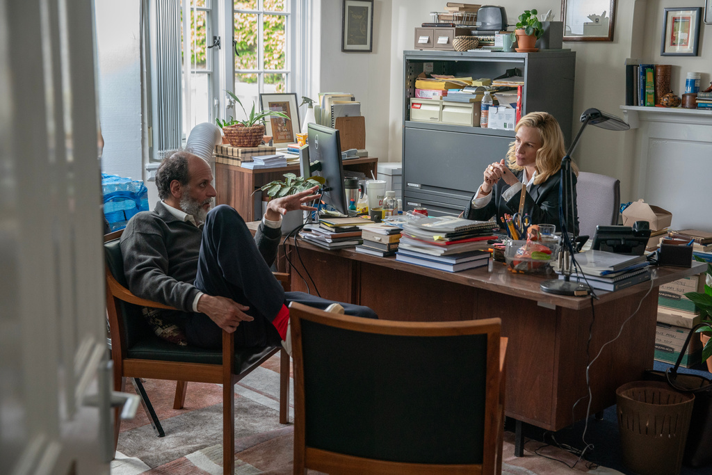 This image released by Amazon MGM Studios shows director Luca Guadagnino, left, and Julia Roberts on the set of "After the Hunt." (Yannis Drakoulidis/Amazon MGM Studios via AP)