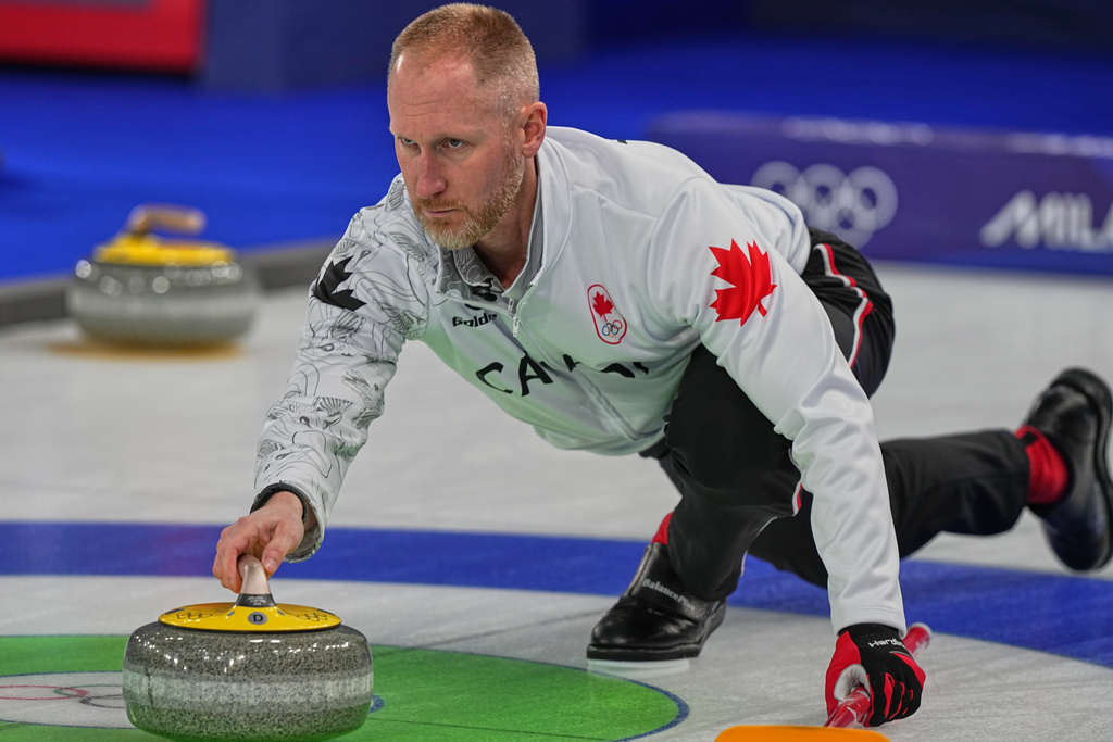 Canada's Brad Jacobs in action during the men's curling round robin session against Norway at the 2026 Winter Olympics, in Cortina d'Ampezzo, Italy, Thursday, Feb. 19, 2026. (AP Photo/Fatima Shbair)