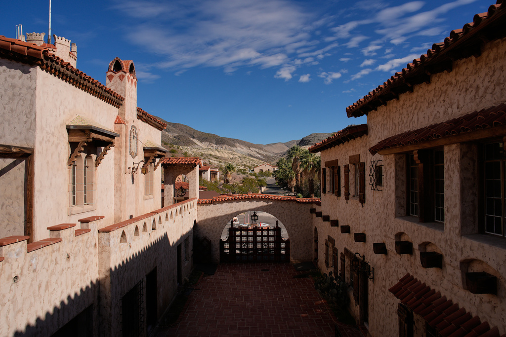 Clouds drift over Scotty's Castle, Friday, Jan. 23, 2026, in Death Valley National Park, Calif. (AP Photo/John Locher)