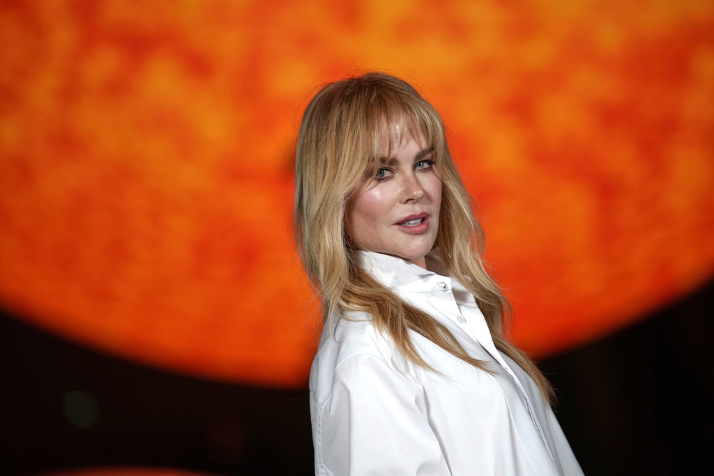FILE - Nicole Kidman poses for photographers upon arrival at the Chanel Spring/Summer 2026 collection presented in Paris, Monday, Oct. 6, 2025. (AP Photo/Christophe Ena, File)
