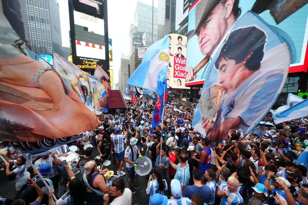 Argentina fans gather for a rally on the eve of the World Cup final soccer match in New York's Time Square, Saturday, July 18, 2026. (AP Photo/Julio Cortez)