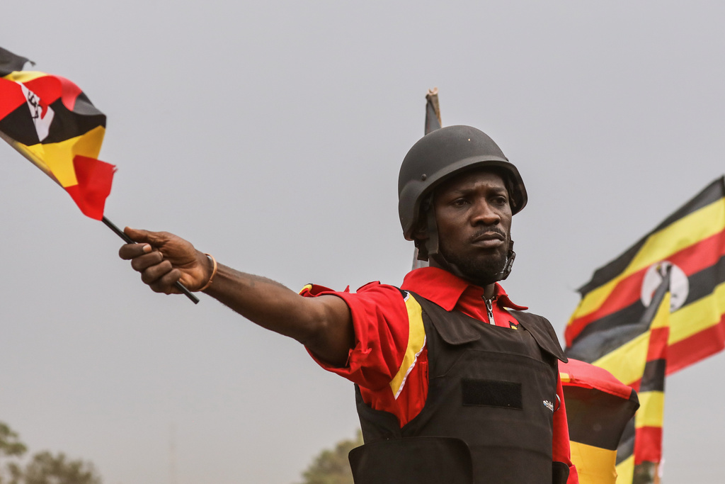 Uganda opposition presidential candidate Robert Kyagulanyi Ssentamu who is known as Bobi Wine waves to supporters at an election campaign rally in Mukono, Uganda, Friday, Jan. 9, 2026. (AP Photo/Hajarah Nalwadda)