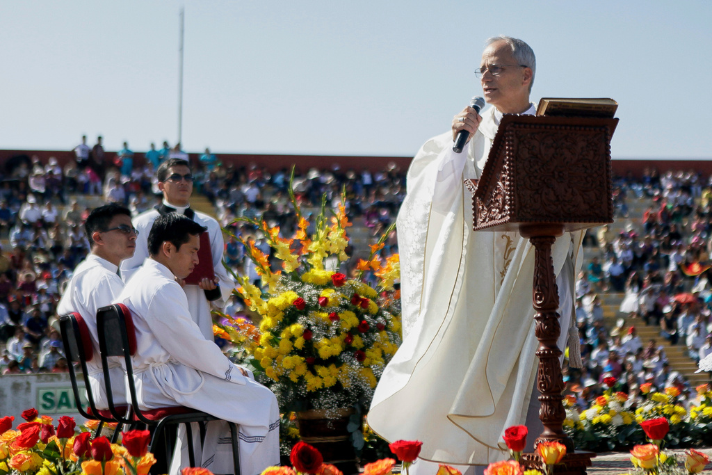 FILE - Pope Leo XIV, then Apostolic Administrator of Chiclayo Robert Prevost, preaches during a Corpus Christi celebration in a stadium in Chiclayo, Peru, June 19, 2015. (AP Photo/Julio Reano, File)