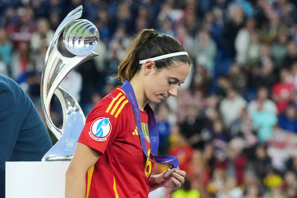 FILE - Spain's Aitana Bonmati walks past the trophy with her runners up medal after the Women's Euro 2025 final soccer match between England and Spain at St. Jakob-Park in Basel, Switzerland, Sunday, July 27, 2025. (AP Photo/Martin Meissner, File)