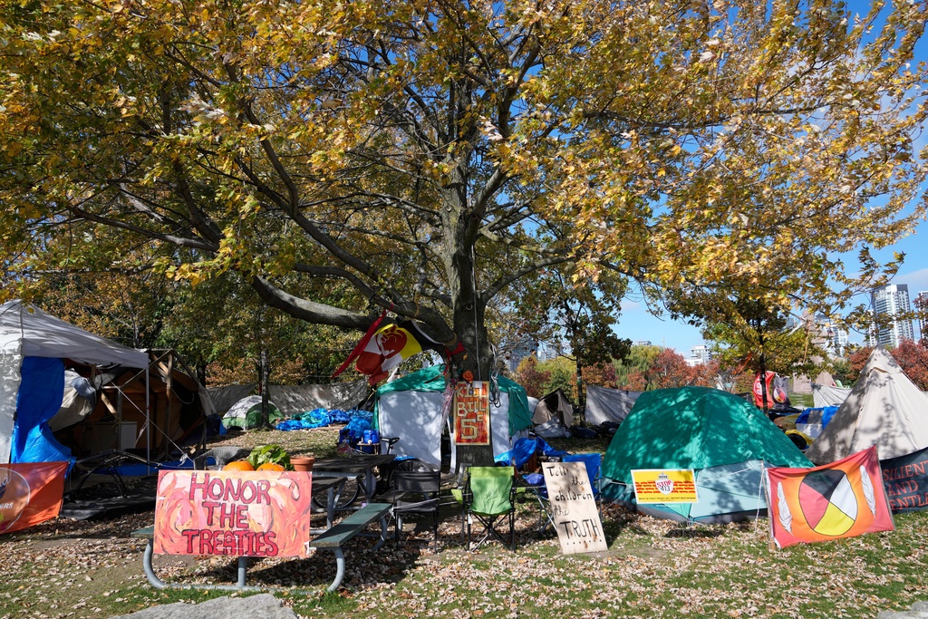 Indigenous peoples set up tents to protest the government in Toronto, Wednesday, Oct. 29, 2025. (AP Photo/Kamran Jebreili)