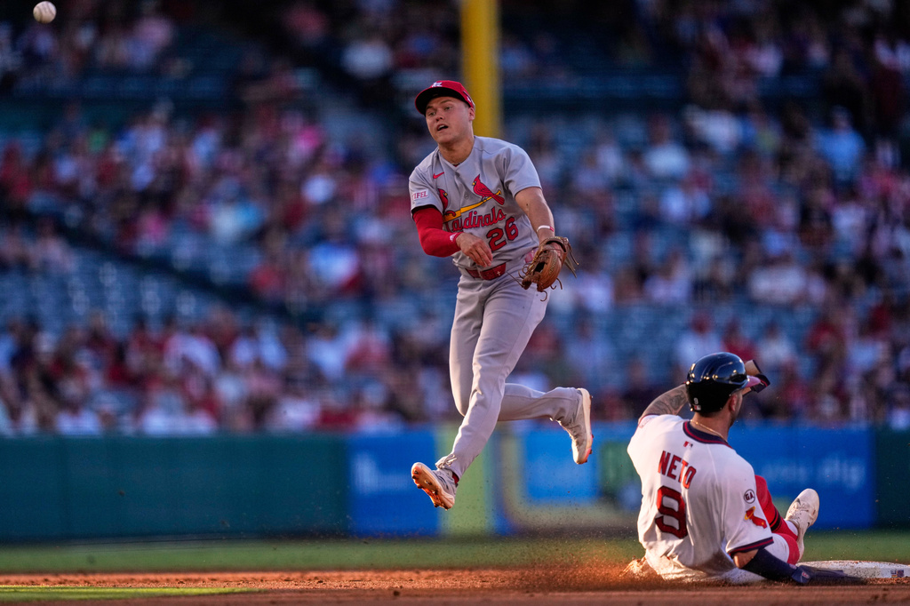 Los Angeles Angels' Zach Neto, right, is forced out at second as St. Louis Cardinals second baseman JJ Wetherholt throws out Mike Trout at first during the second inning of a baseball game Tuesday, July 21, 2026, in Anaheim, Calif. (AP Photo/Mark J. Terrill)