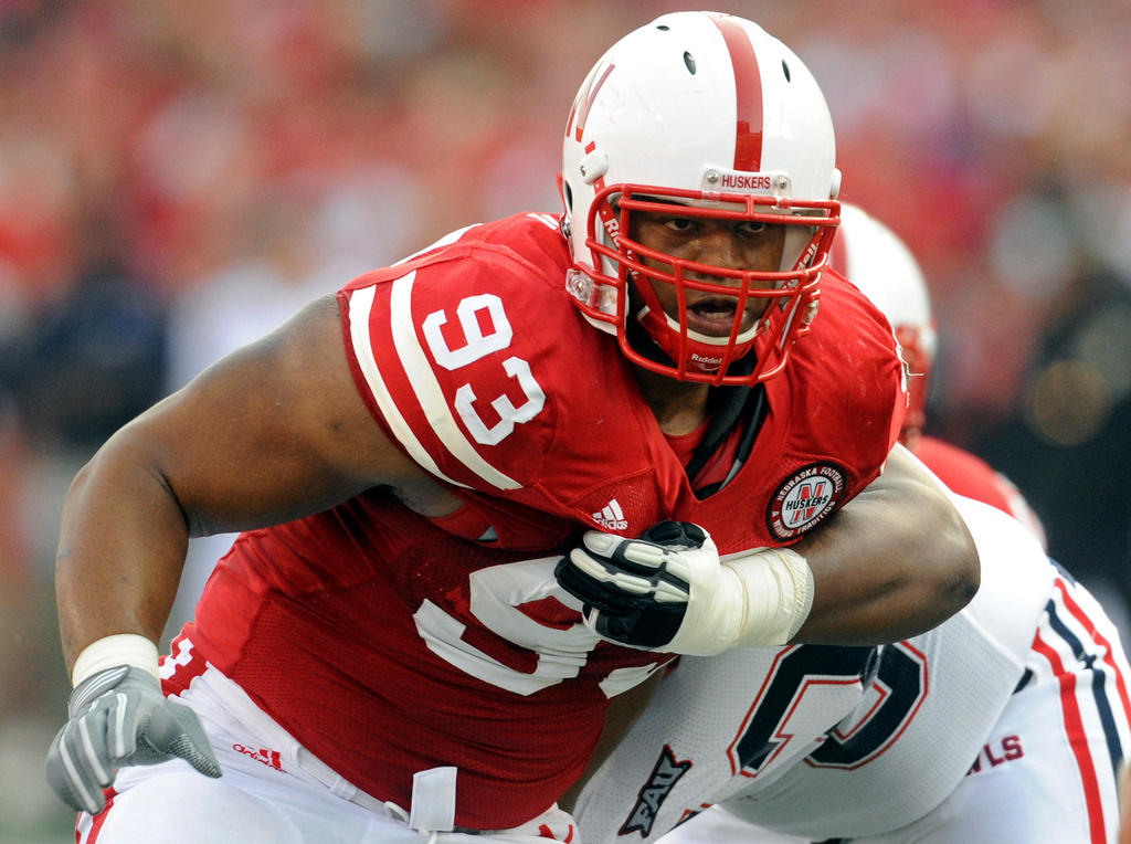 FILE - In this Sept. 5, 2009, file photo, Nebraska's Ndamukong Suh (93) rushes against a Florida Atlantic player during an NCAA football game in Lincoln, Neb. (AP Photo/Dave Weaver, File)